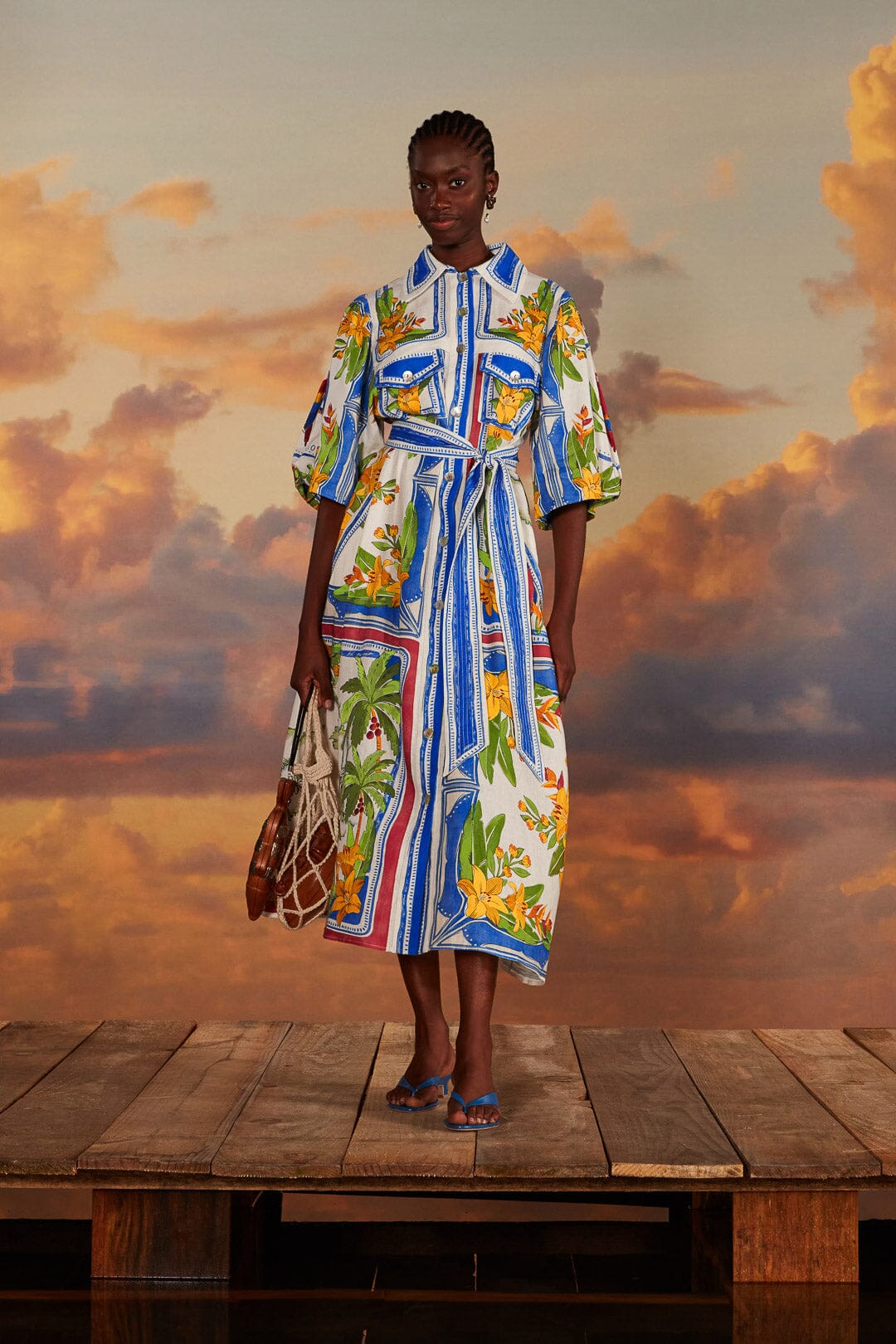 FARM Rio model wearing the Tropical Destination Off-White Midi Dress
