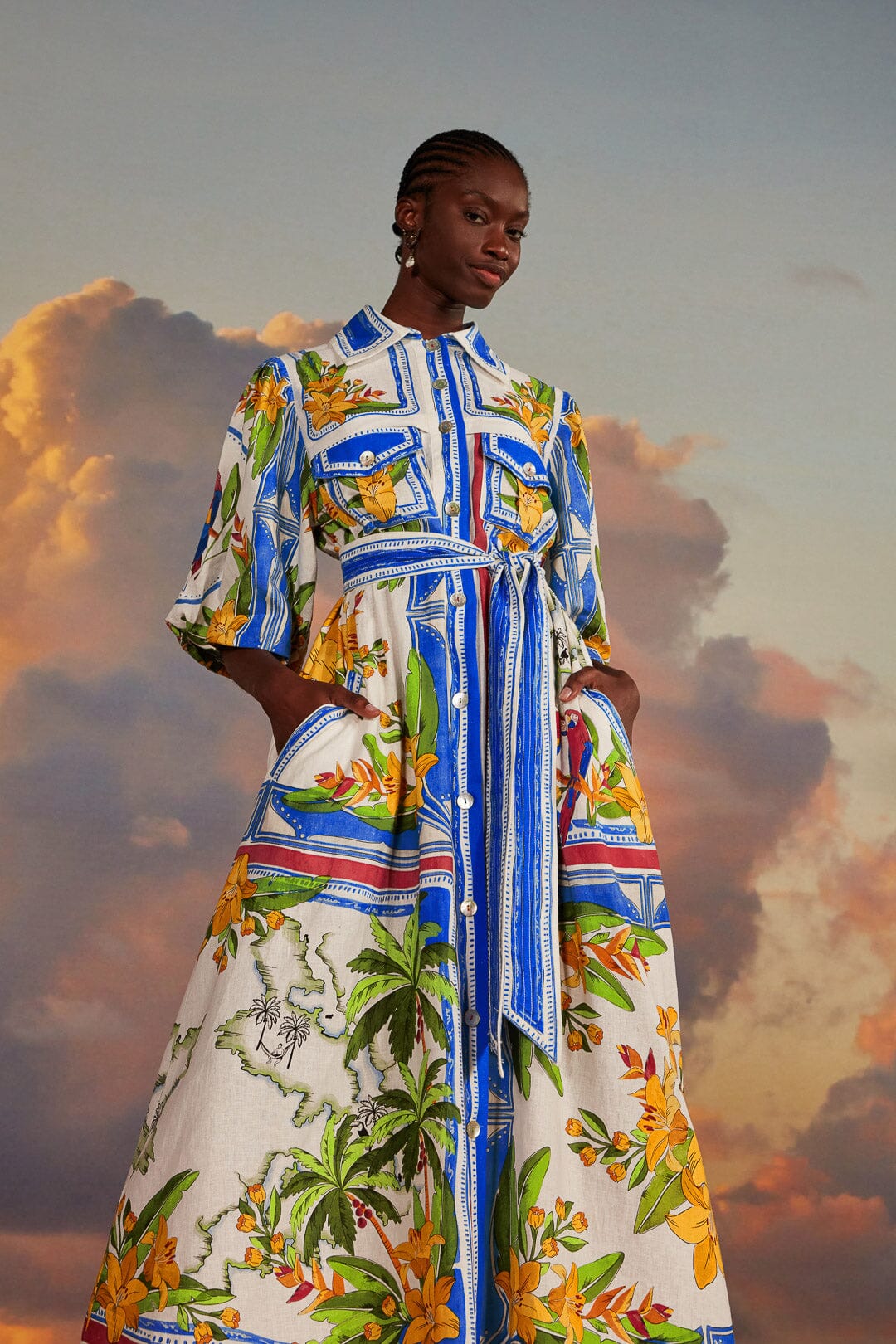 FARM Rio model wearing the Tropical Destination Off-White Midi Dress