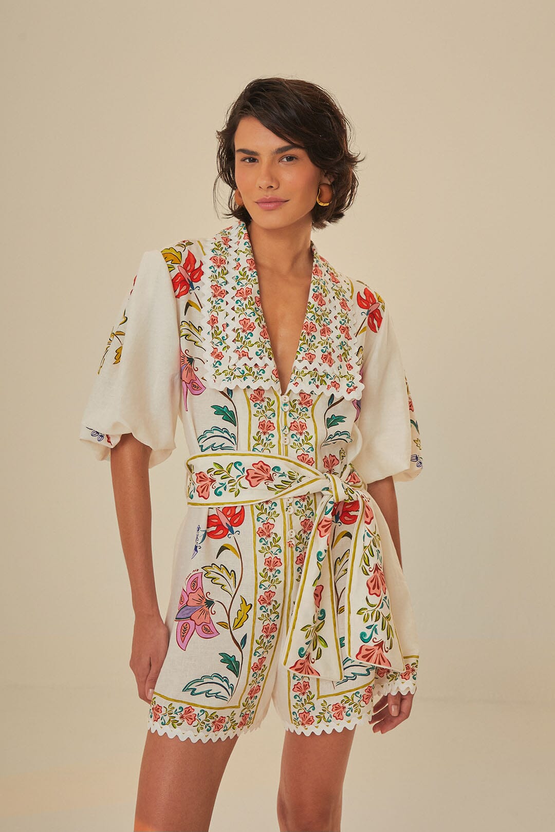 FARM Rio model wearing the Floral Insects Off White Romper