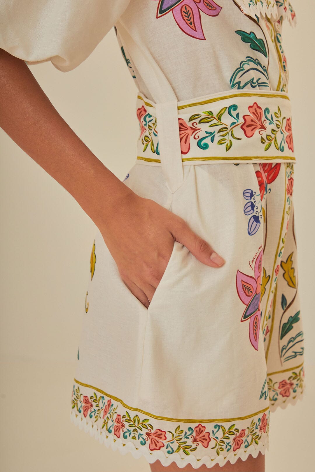 FARM Rio model wearing the Floral Insects Off White Romper