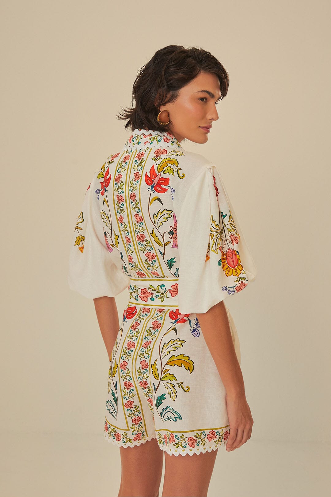 FARM Rio model wearing the Floral Insects Off White Romper