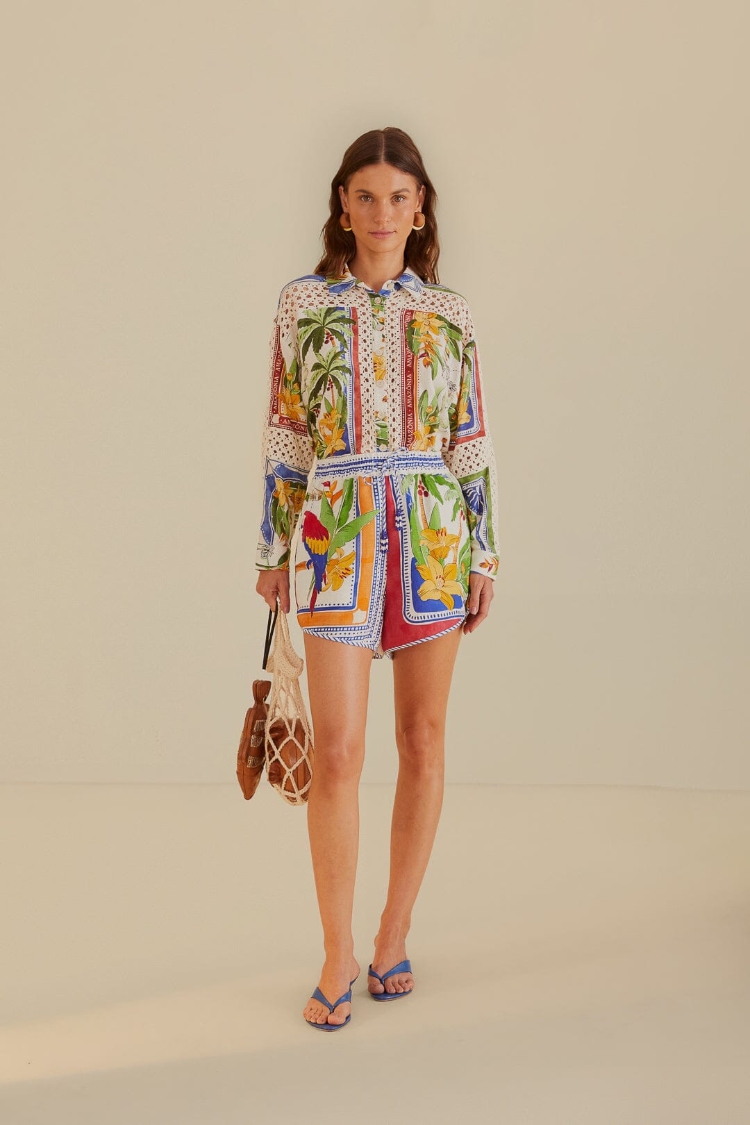 FARM Rio model wearing the Tropical Destination Off-White Shorts