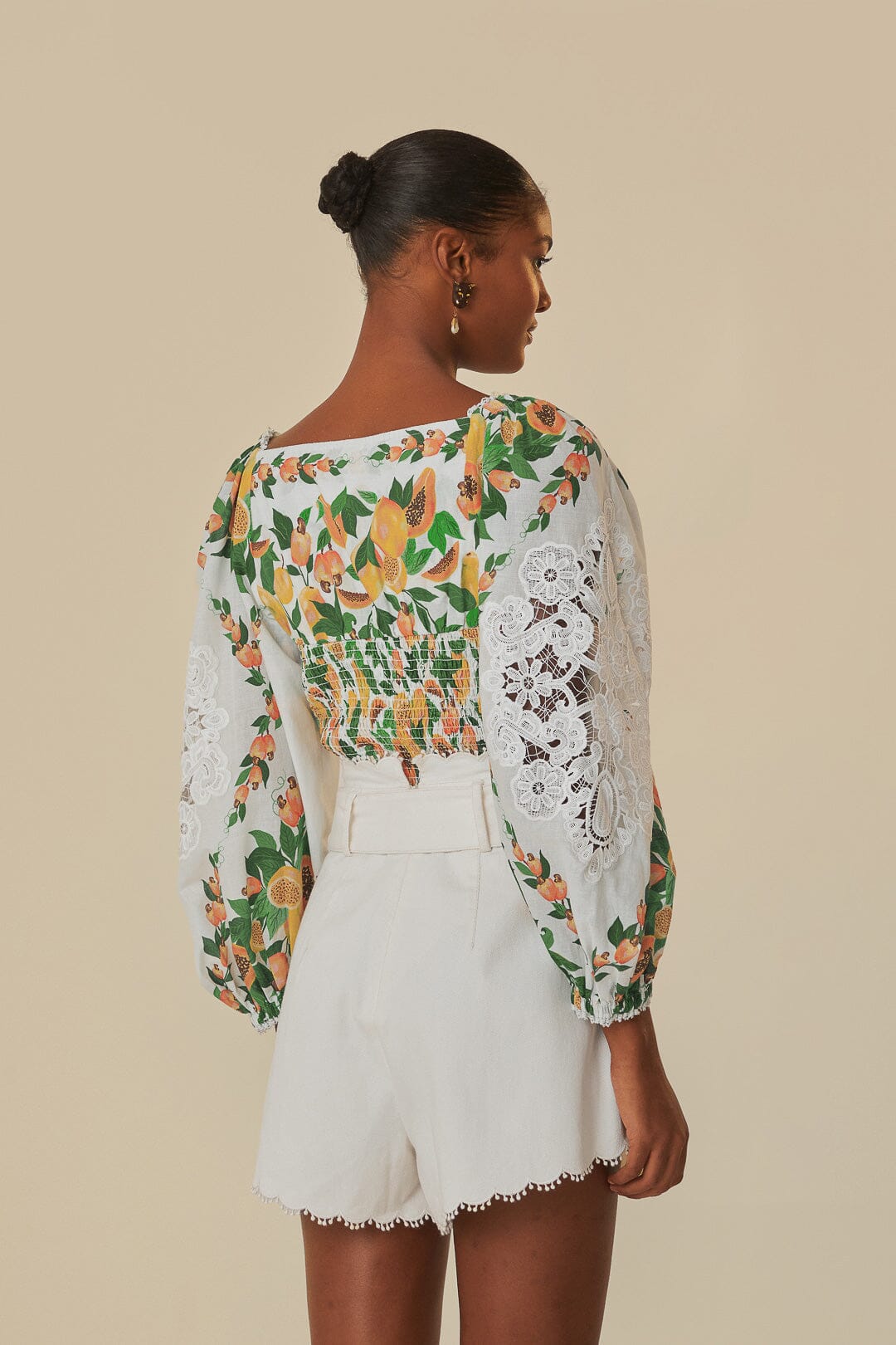 FARM Rio model wearing the Papaya Salad Off-White Blouse