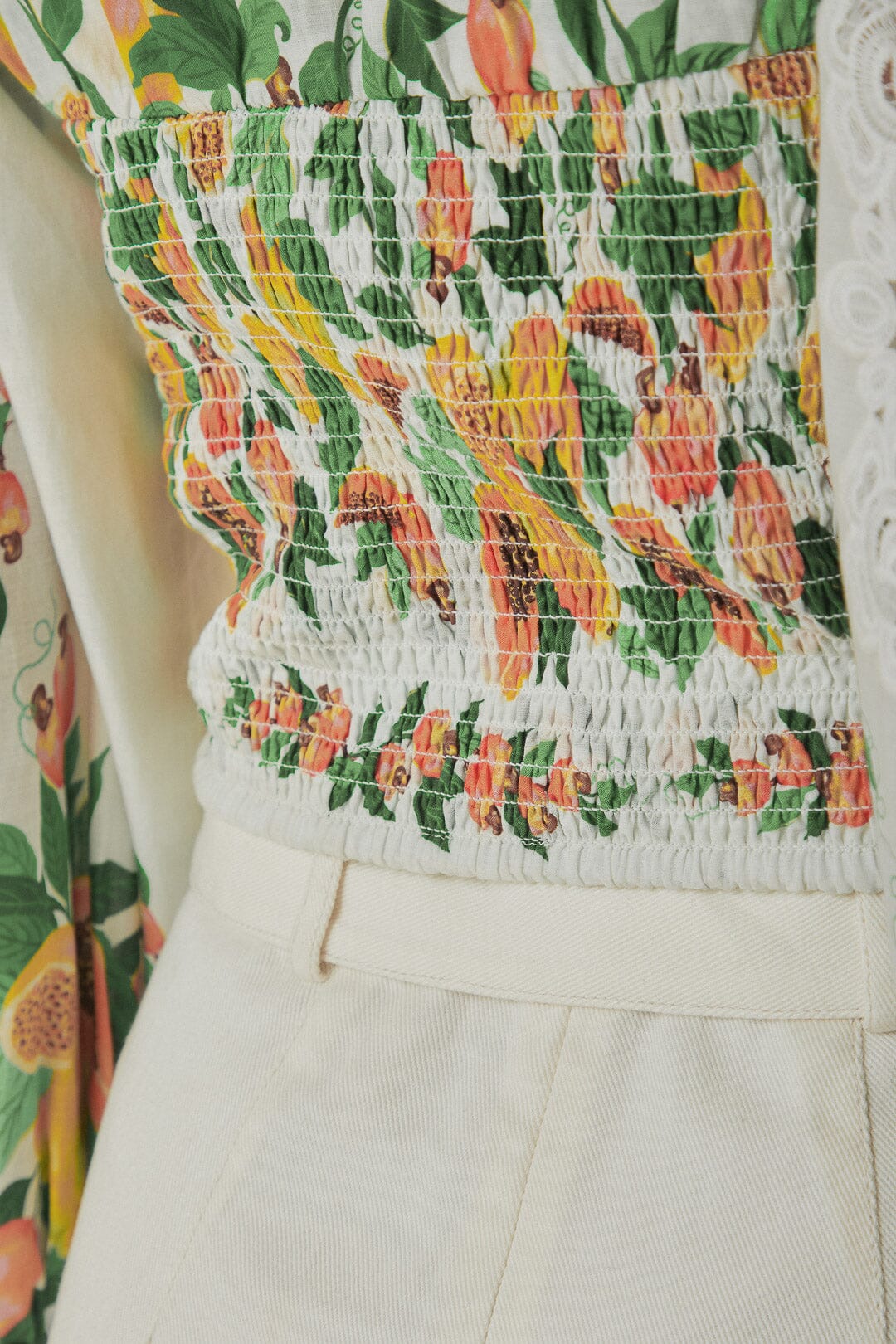 FARM Rio model wearing the Papaya Salad Off-White Blouse