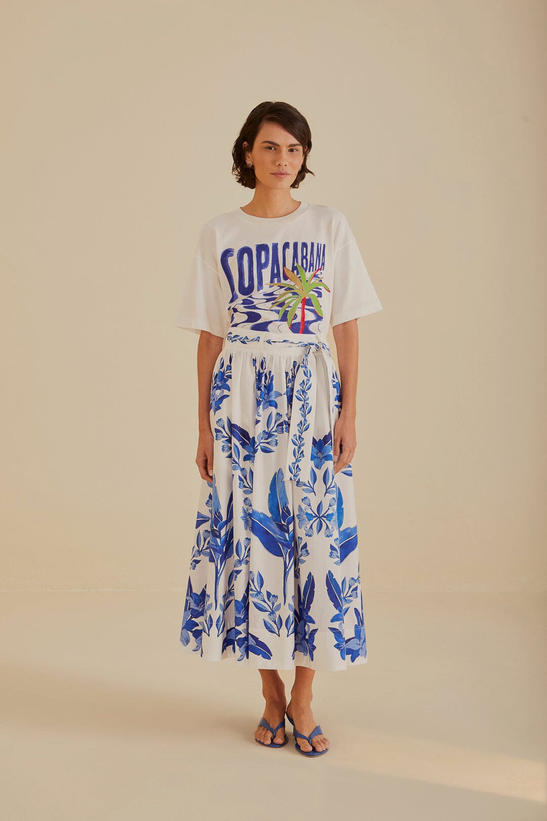 FARM Rio model wearing the Blue Yard Off-White Midi Skirt