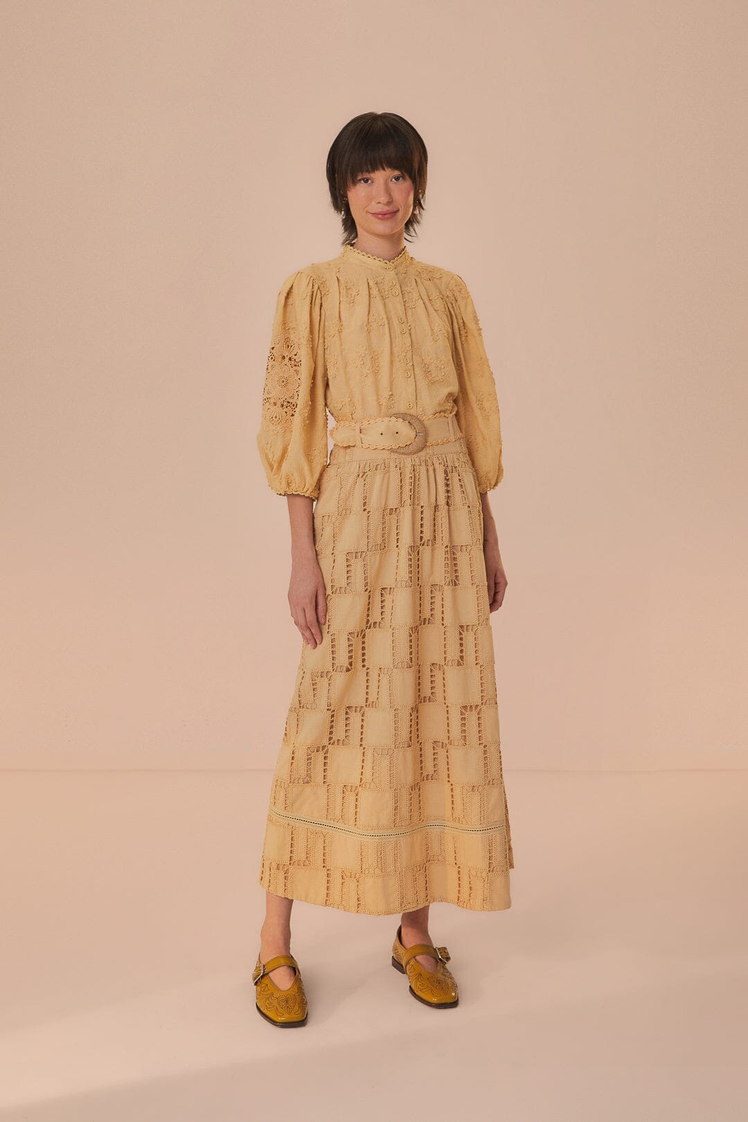 FARM Rio model wearing the Sand 3D Flower Blouse