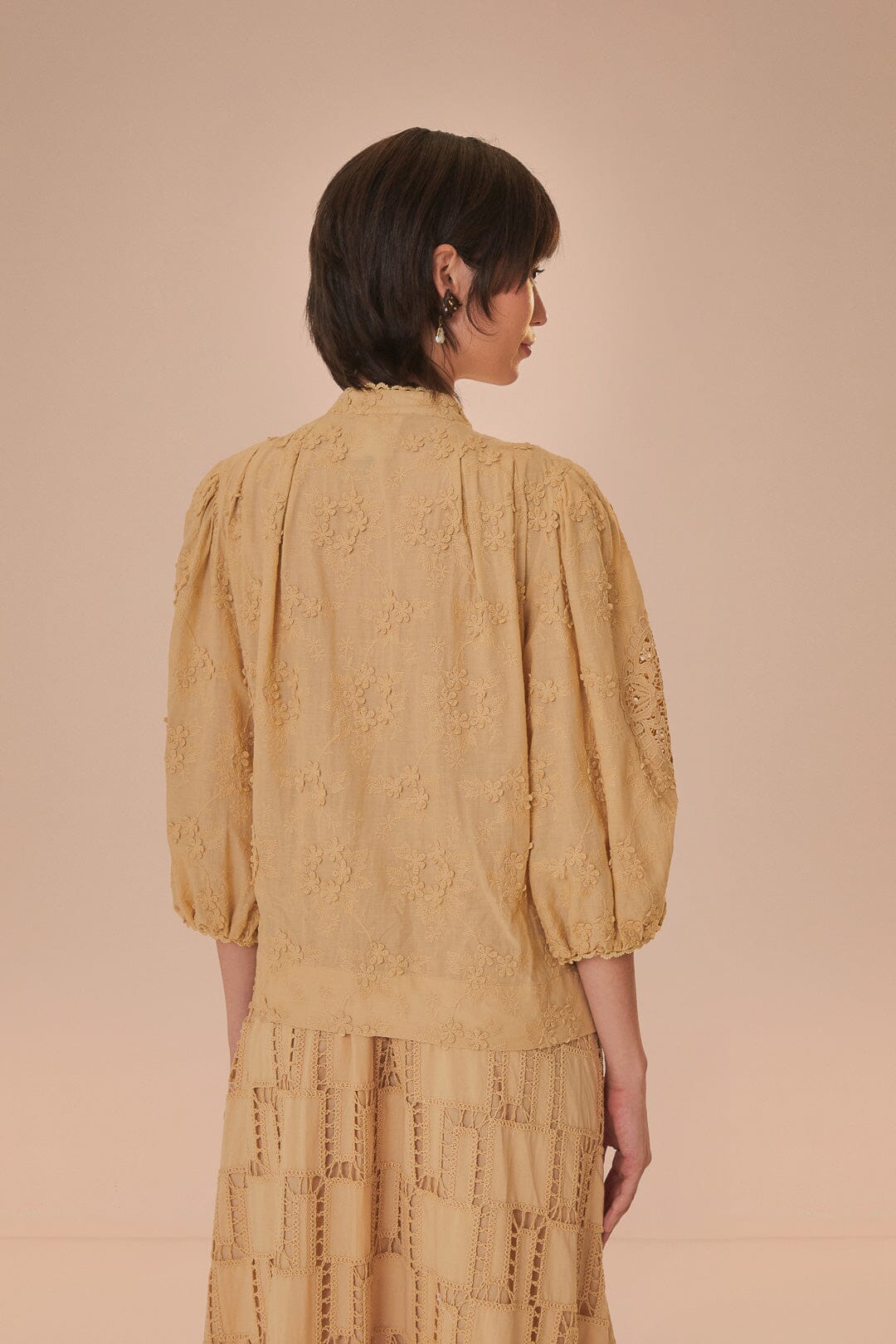FARM Rio model wearing the Sand 3D Flower Blouse
