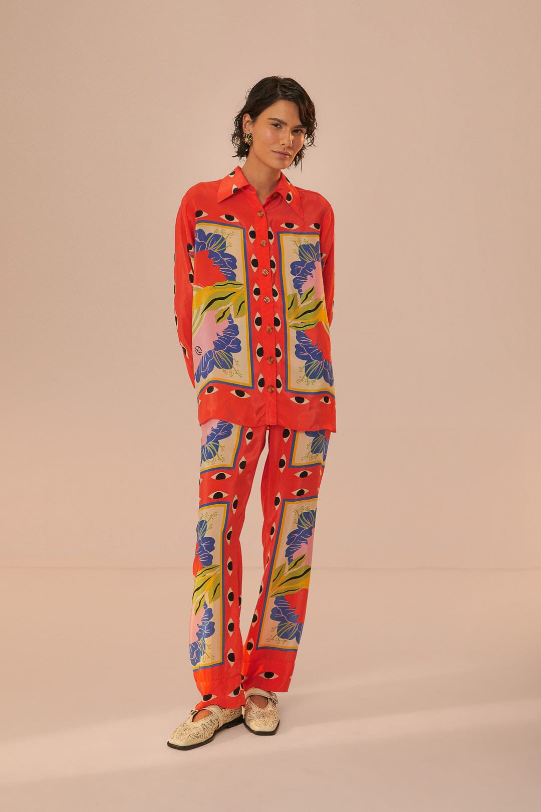 FARM Rio model wearing the Surreal Scarf Sand Pijama Shirt