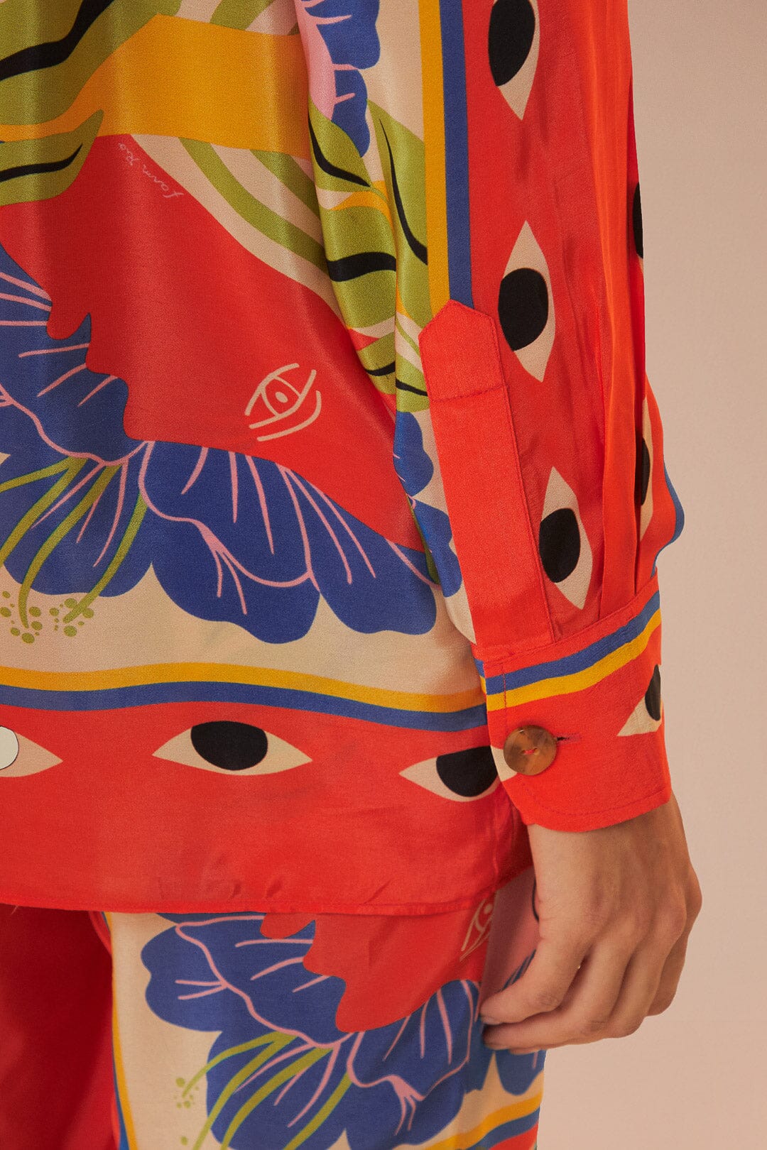 FARM Rio model wearing the Surreal Scarf Sand Pijama Shirt