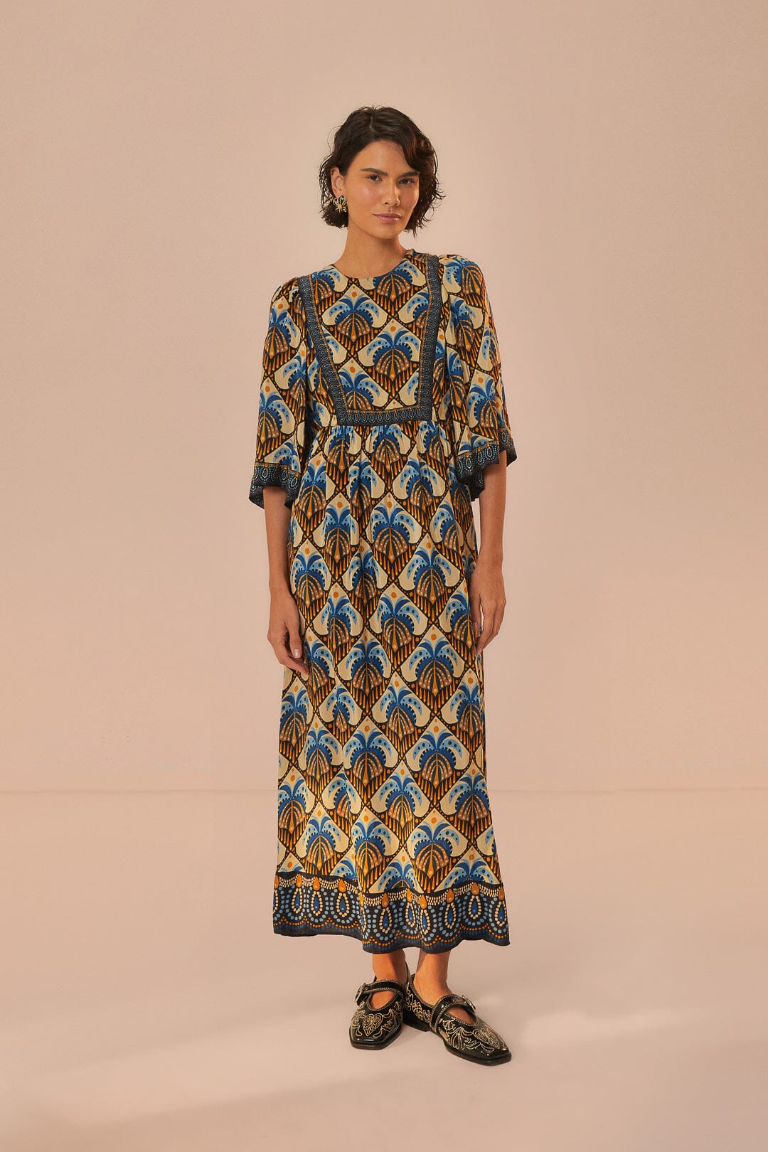 FARM Rio model wearing the Cocopalm Beige Maxi Dress