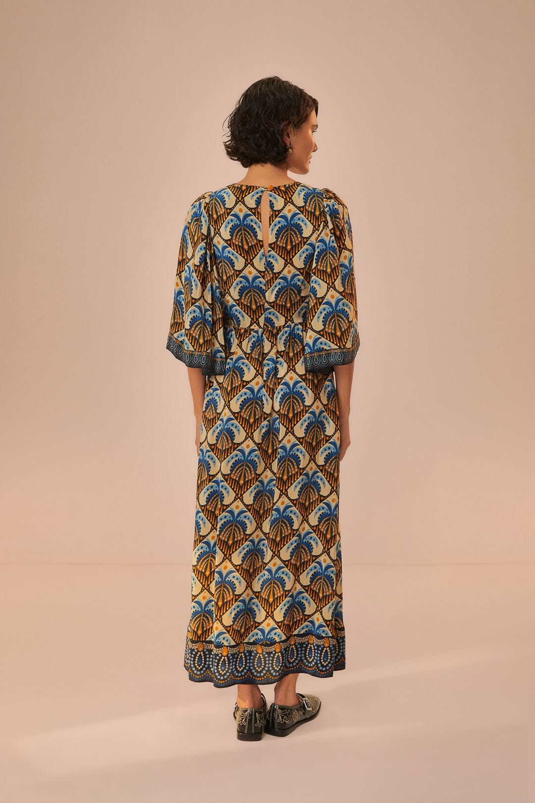 FARM Rio model wearing the Cocopalm Beige Maxi Dress