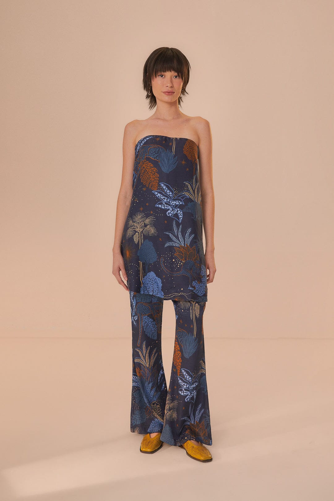 FARM Rio model wearing the Night Jungle Navy Blue Flare Pants