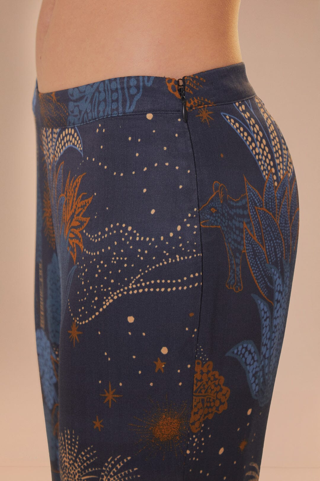 FARM Rio model wearing the Night Jungle Navy Blue Flare Pants
