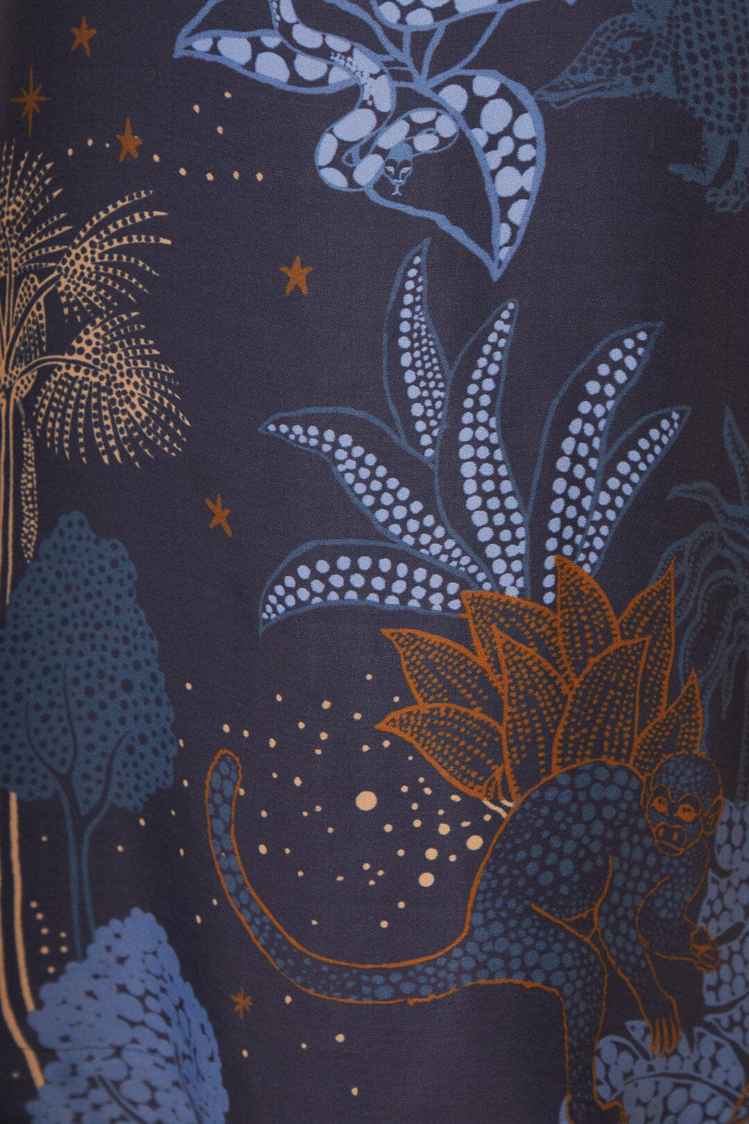 FARM Rio model wearing the Night Jungle Navy Blue Flare Pants