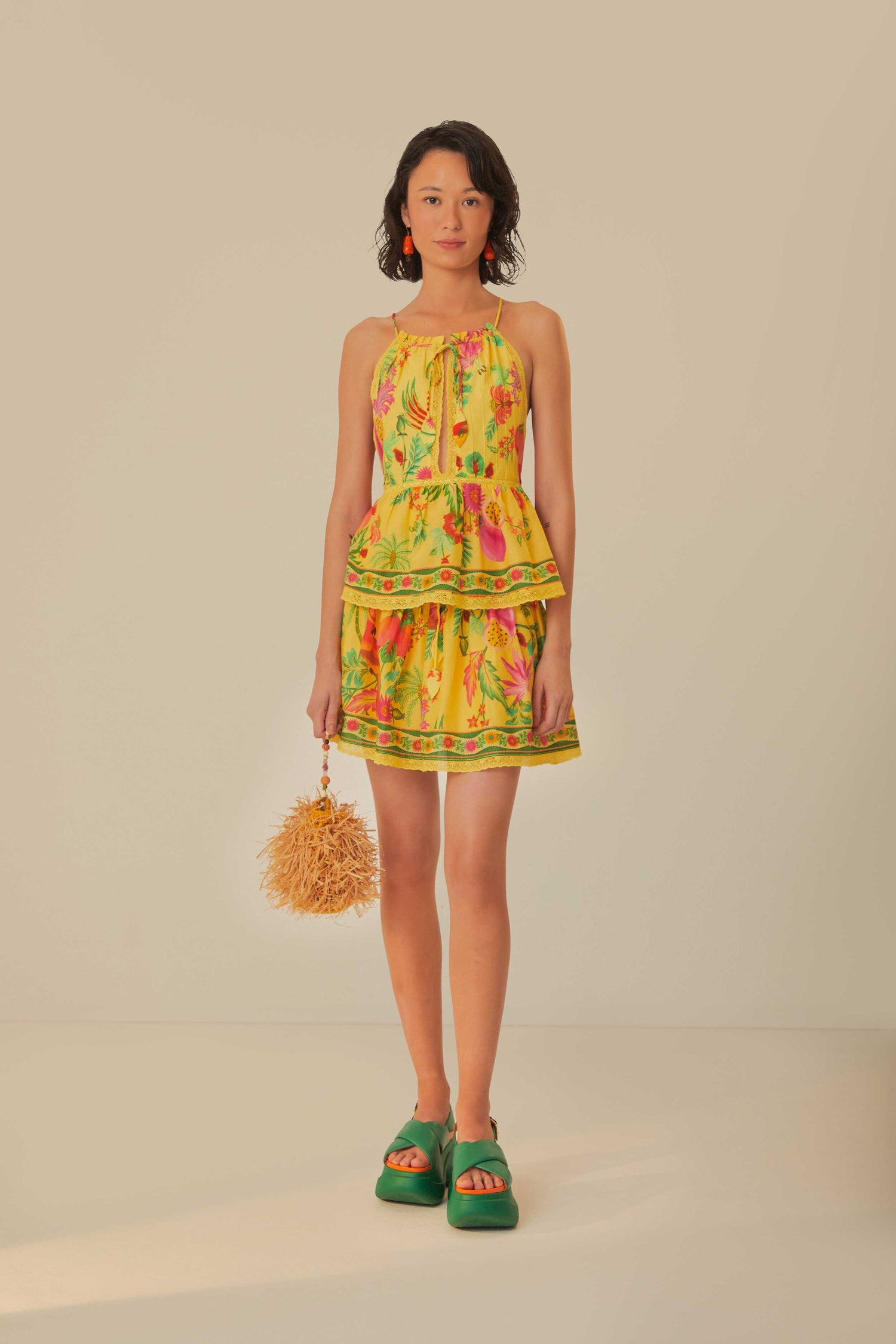 FARM Rio model wearing the Delicate Fruit Garden Yellow Sleeveless Blouse