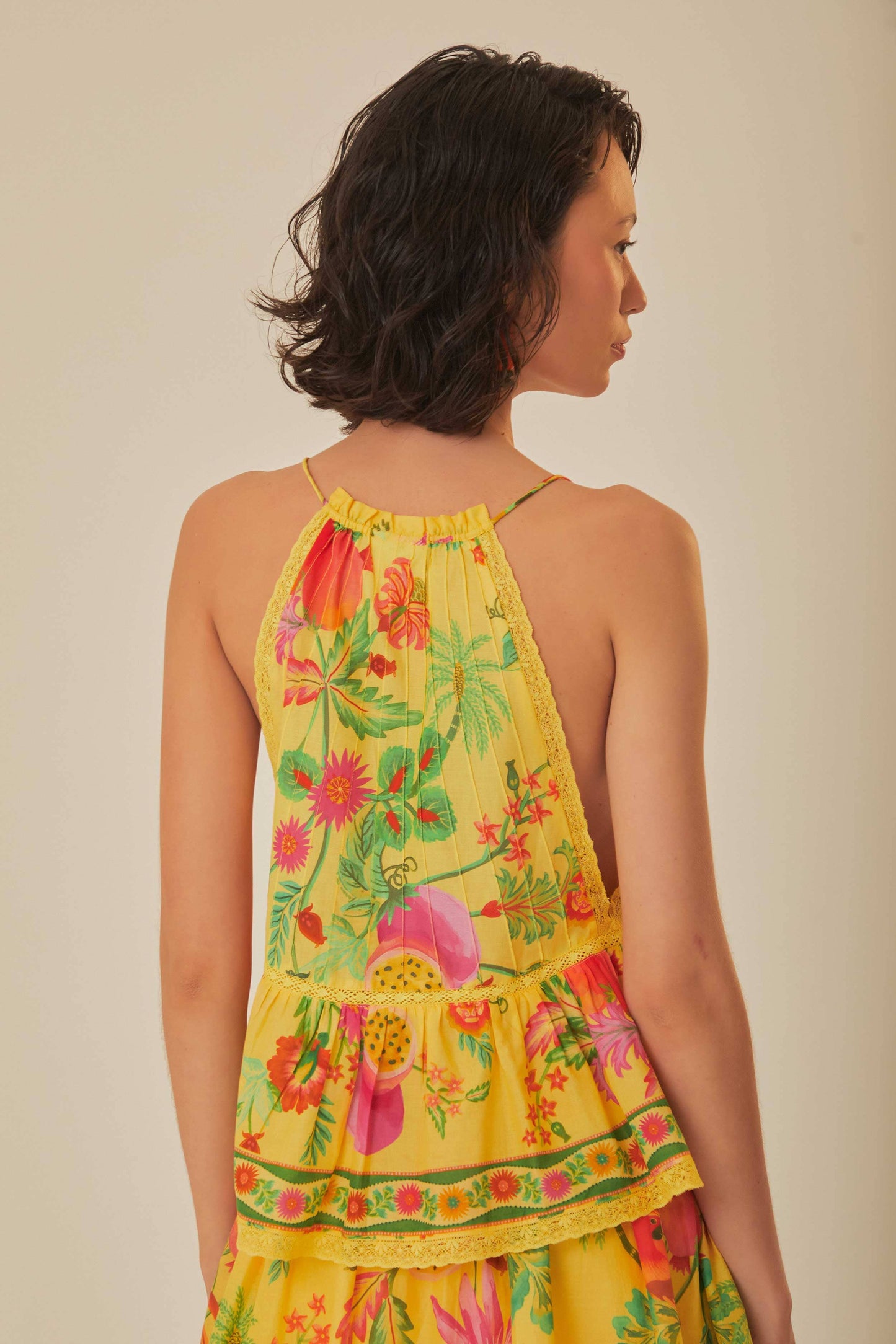 FARM Rio model wearing the Delicate Fruit Garden Yellow Sleeveless Blouse