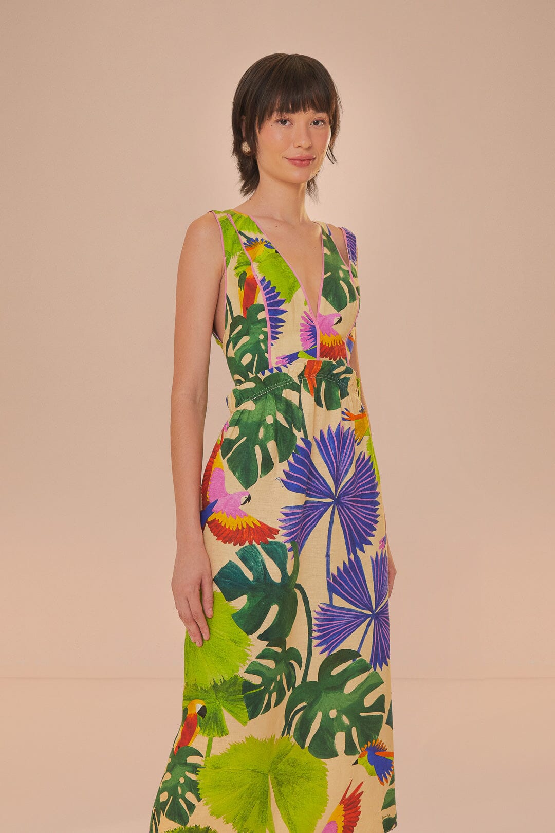 FARM Rio model wearing the Macaw Jungle Sand V Neckline Midi Dress