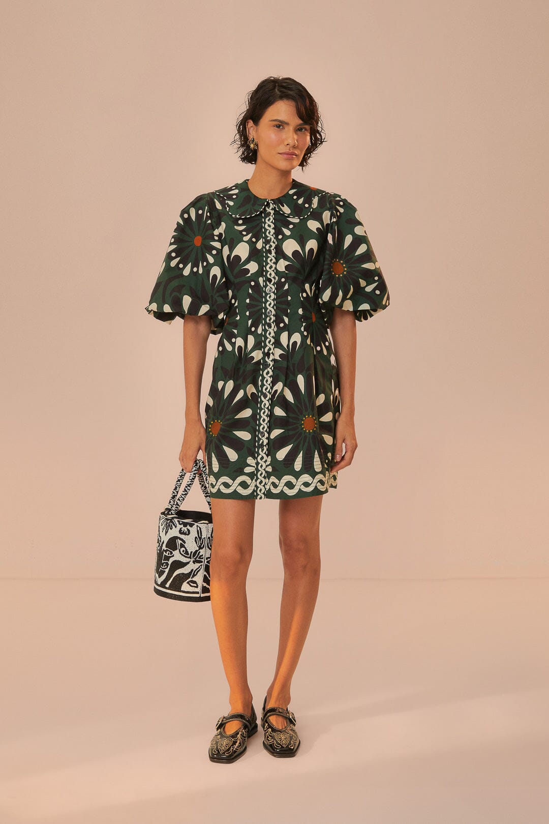 FARM Rio model wearing the Ainika Flowers Green Short Sleeve Mini Dress