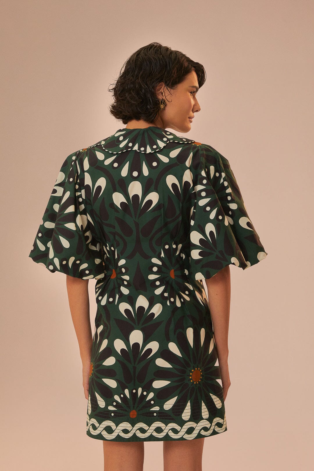 FARM Rio model wearing the Ainika Flowers Green Short Sleeve Mini Dress