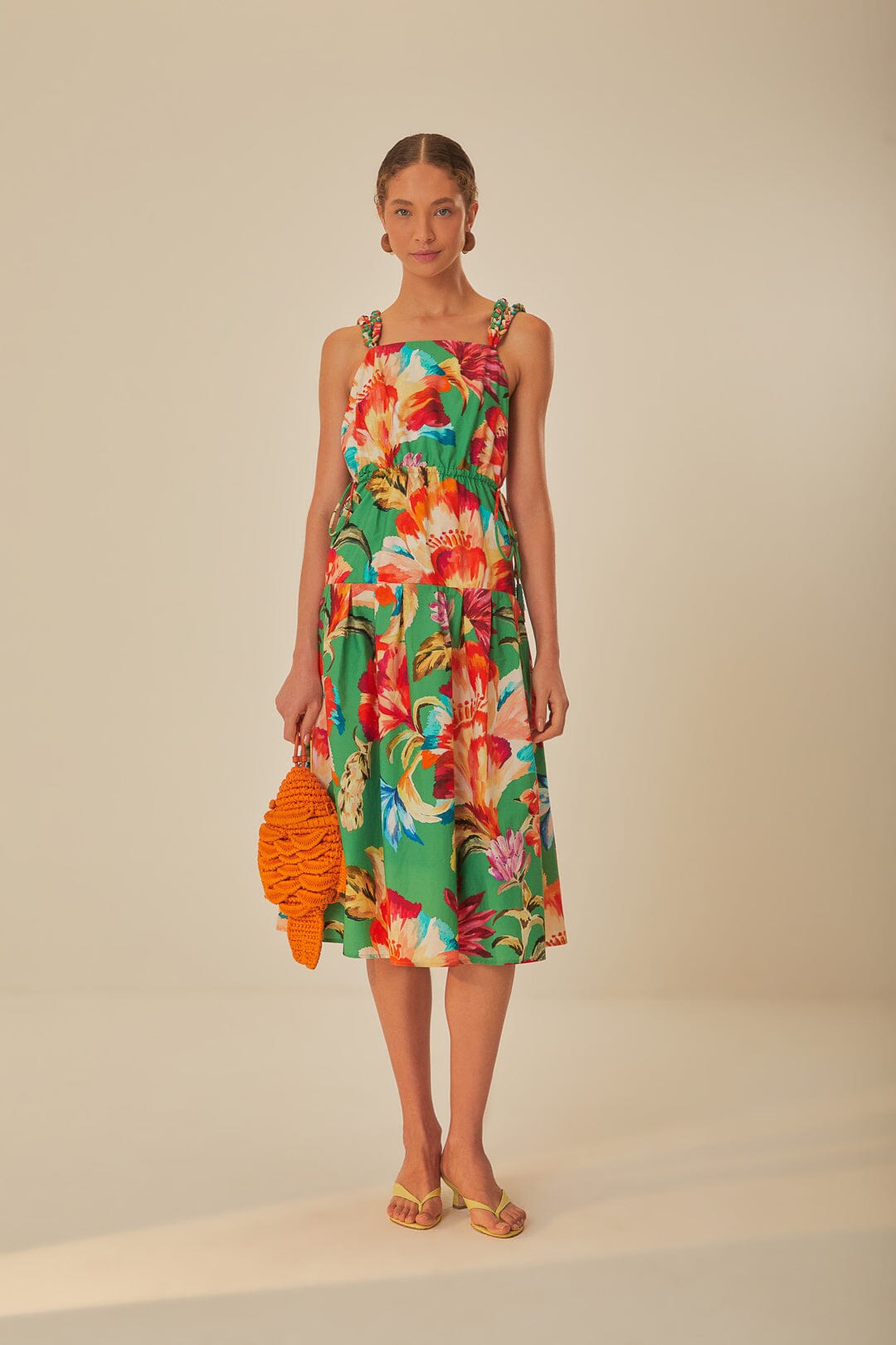 FARM Rio model wearing the Green Tropicart Sleeveless Midi Dress