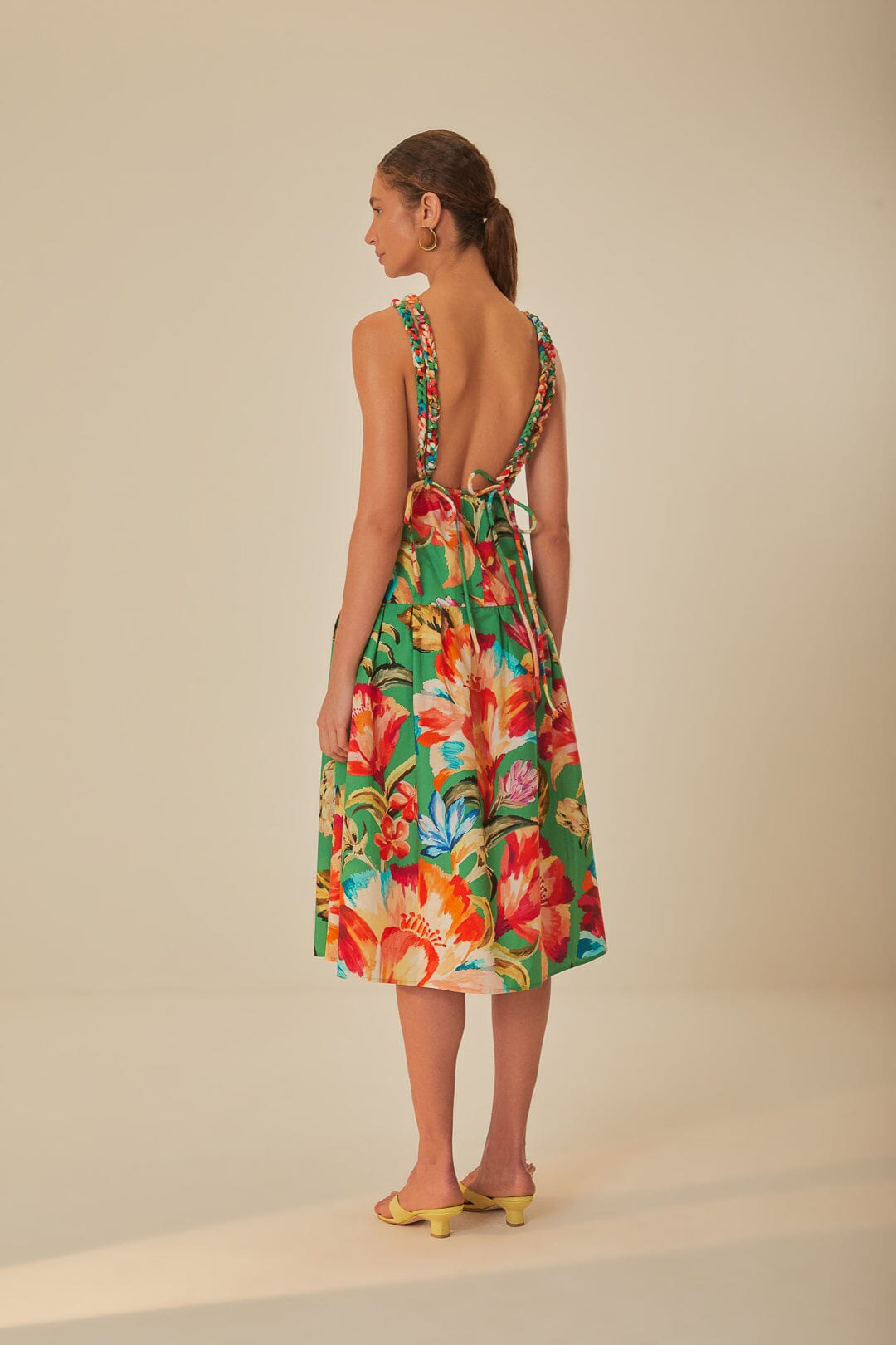 FARM Rio model wearing the Green Tropicart Sleeveless Midi Dress