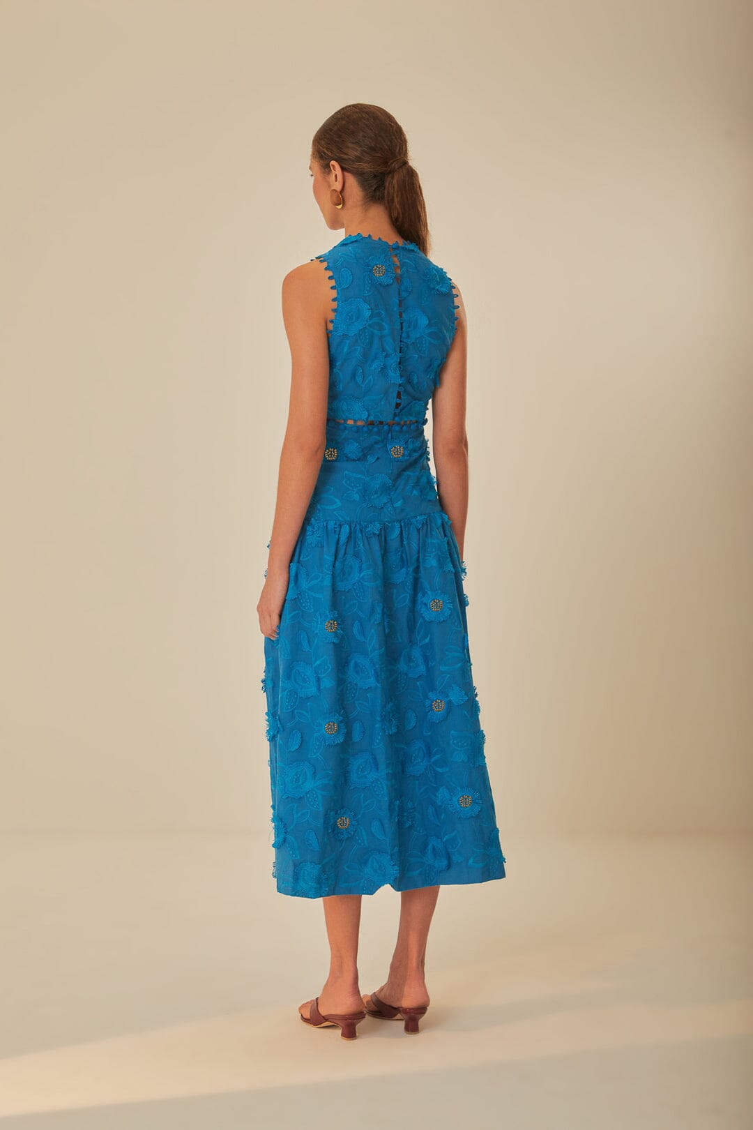 FARM Rio model wearing the 3D Flower Blue V Neckline Sleeveless Maxi Dress