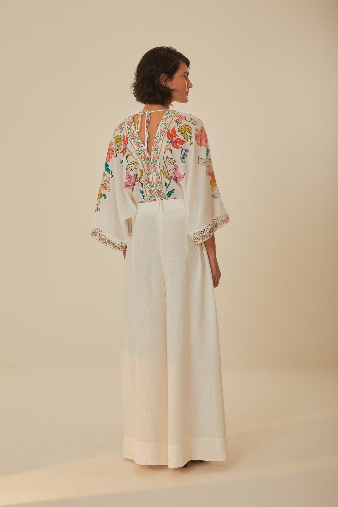FARM Rio model wearing the White Linen Pleat Pants