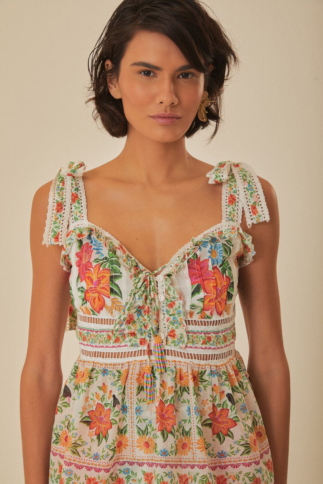 FARM Rio model wearing the Off White Bloom Garden Sleeveless Blouse