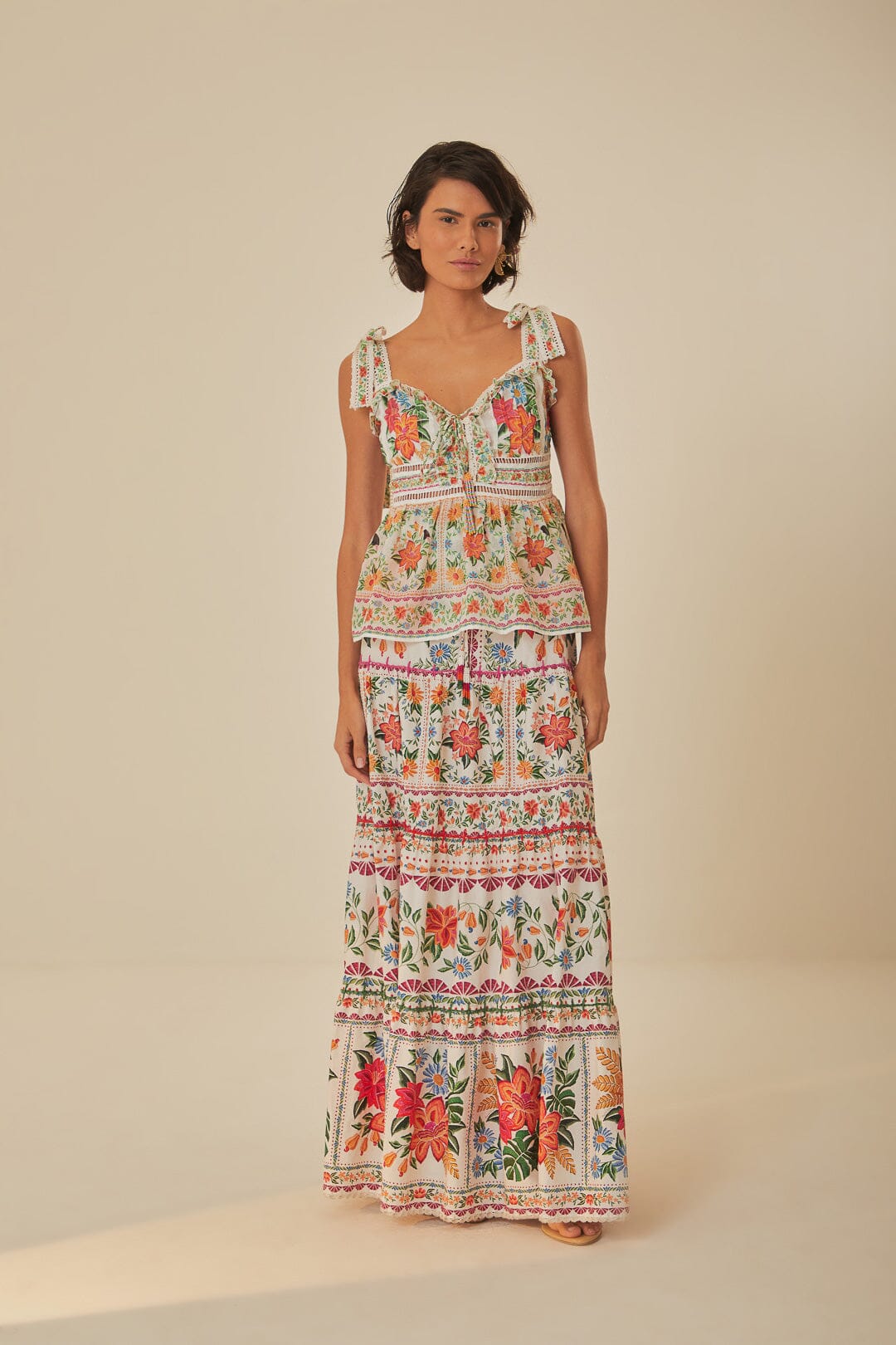 FARM Rio model wearing the Off White Bloom Garden Sleeveless Blouse