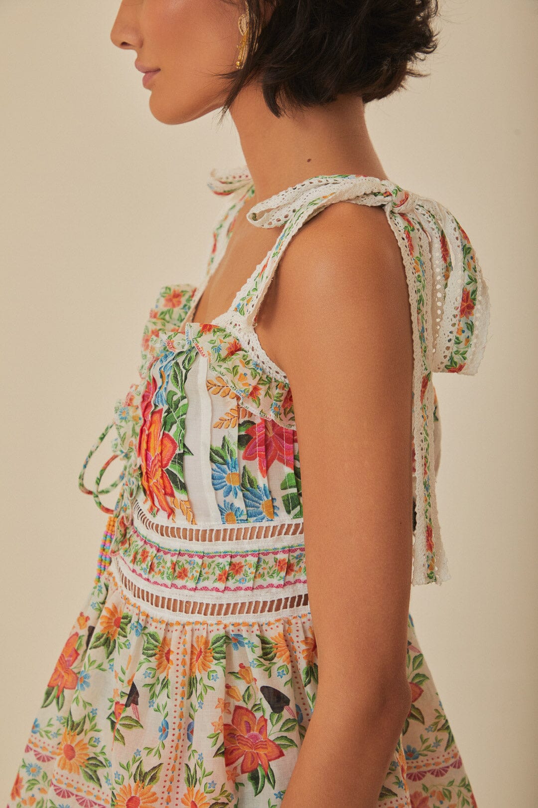 FARM Rio model wearing the Off White Bloom Garden Sleeveless Blouse