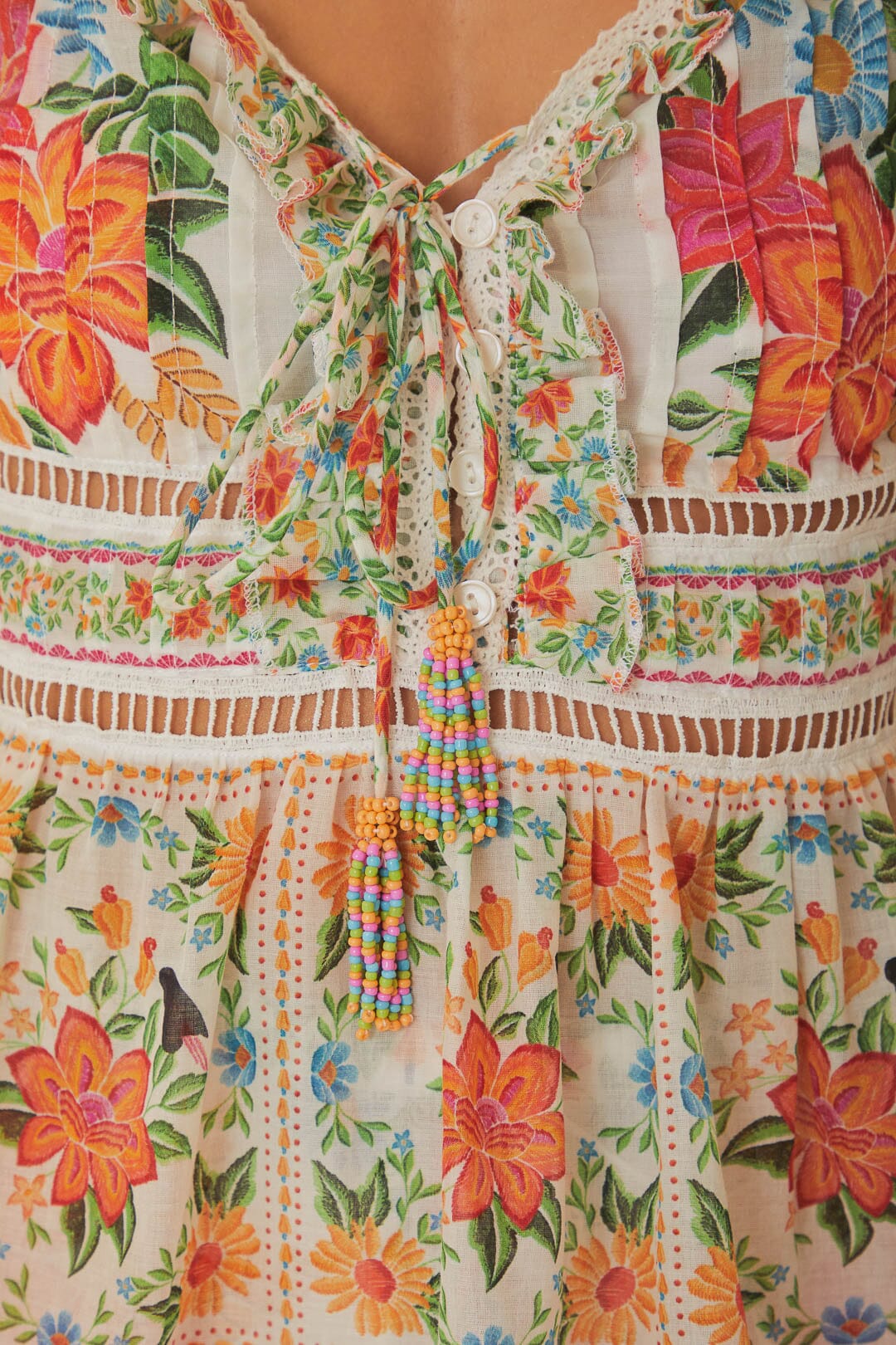 FARM Rio model wearing the Off White Bloom Garden Sleeveless Blouse