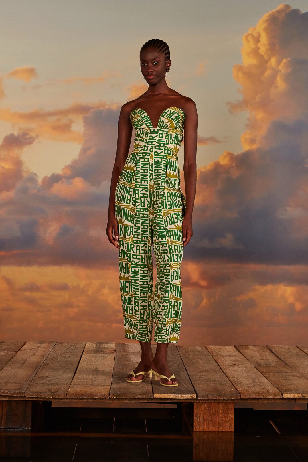 FARM Rio model wearing the Banana Typography Strapless Maxi Jumpsuit