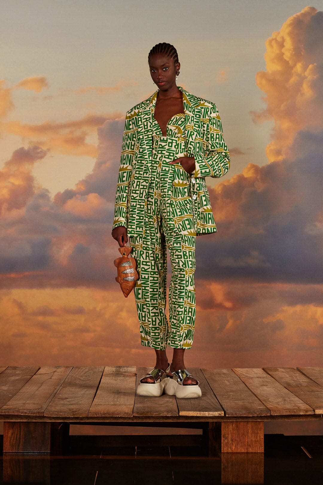 FARM Rio model wearing the Banana Typography Strapless Maxi Jumpsuit