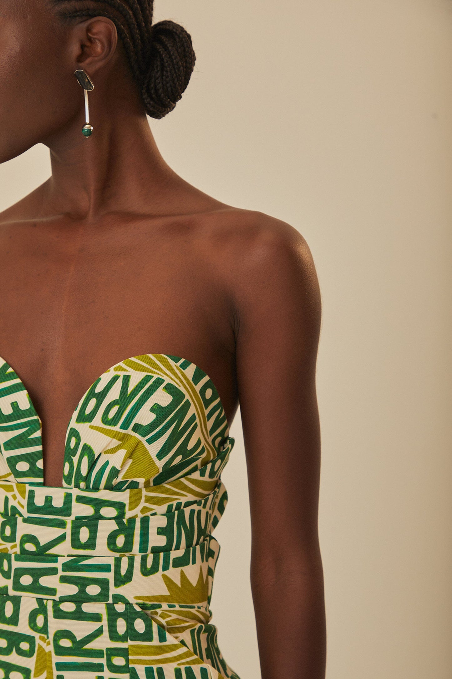 FARM Rio model wearing the Banana Typography Strapless Maxi Jumpsuit