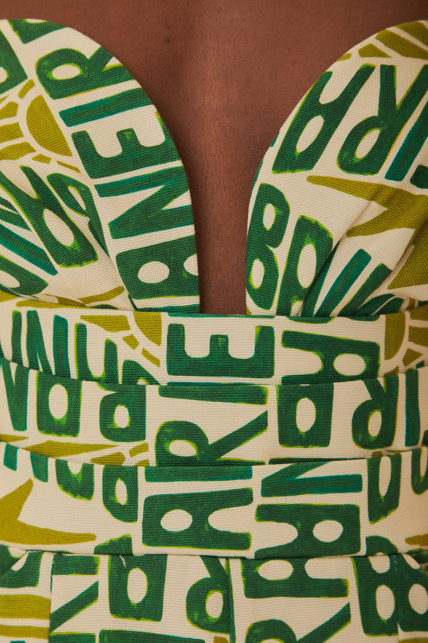 FARM Rio model wearing the Banana Typography Strapless Maxi Jumpsuit
