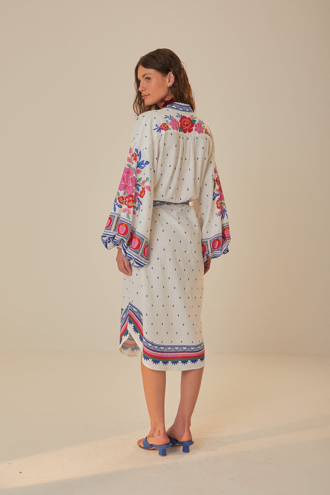 FARM Rio model wearing the Flowers Beach Off White Midi Dress
