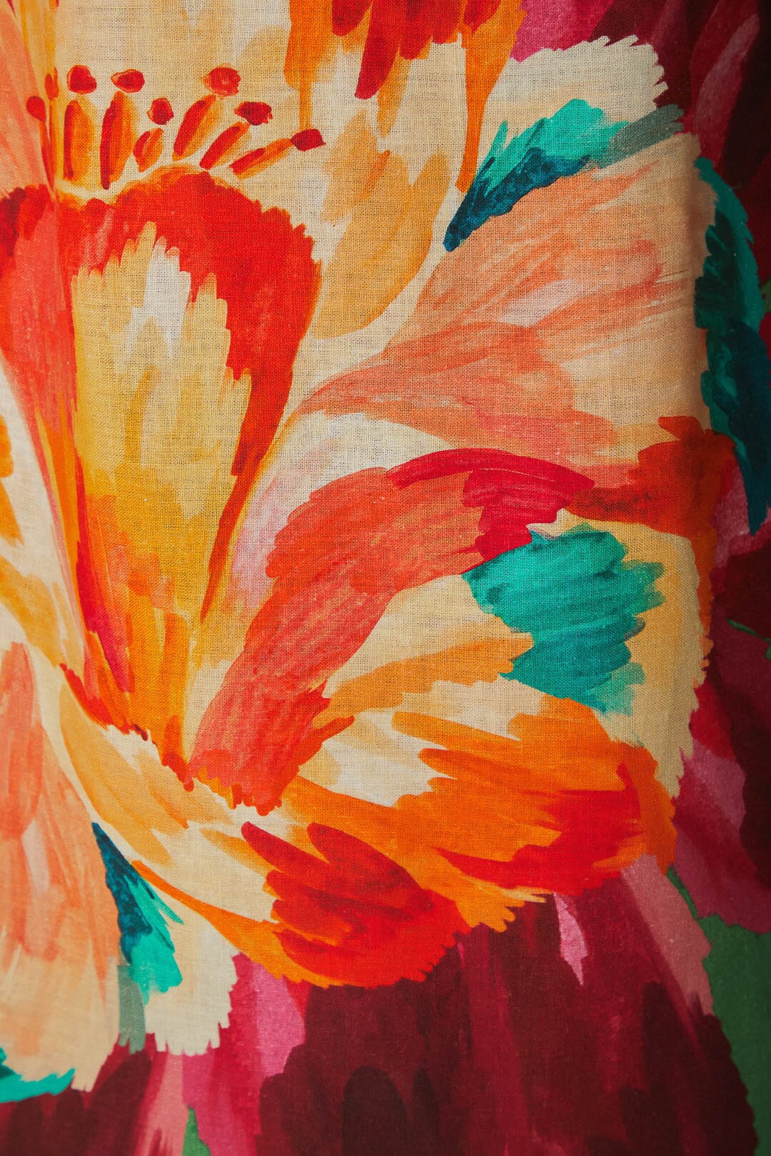 FARM Rio model wearing the Tropicart Green Mini Dress