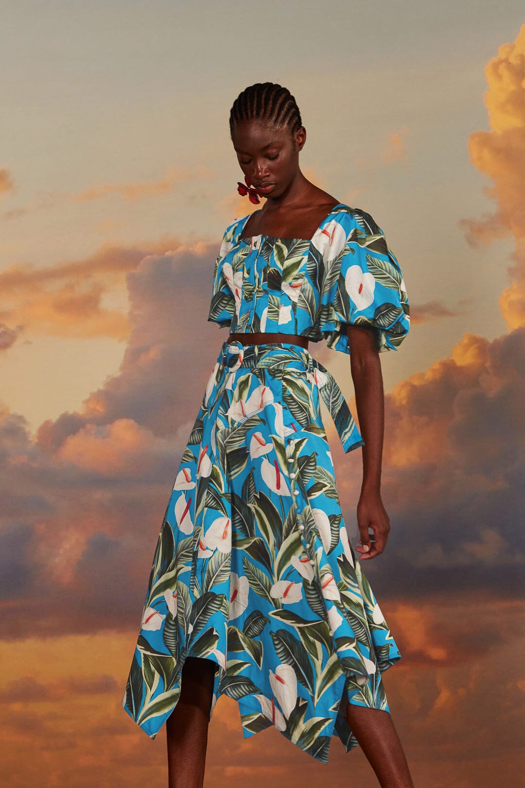 FARM Rio model wearing the Anthurium Garden Blue Asymmetric Midi Skirt