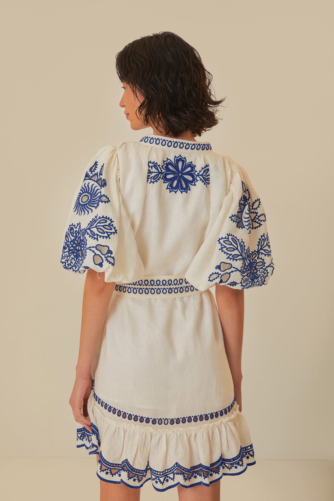 FARM Rio model wearing the White Richelieu Short Sleeve Mini Dress