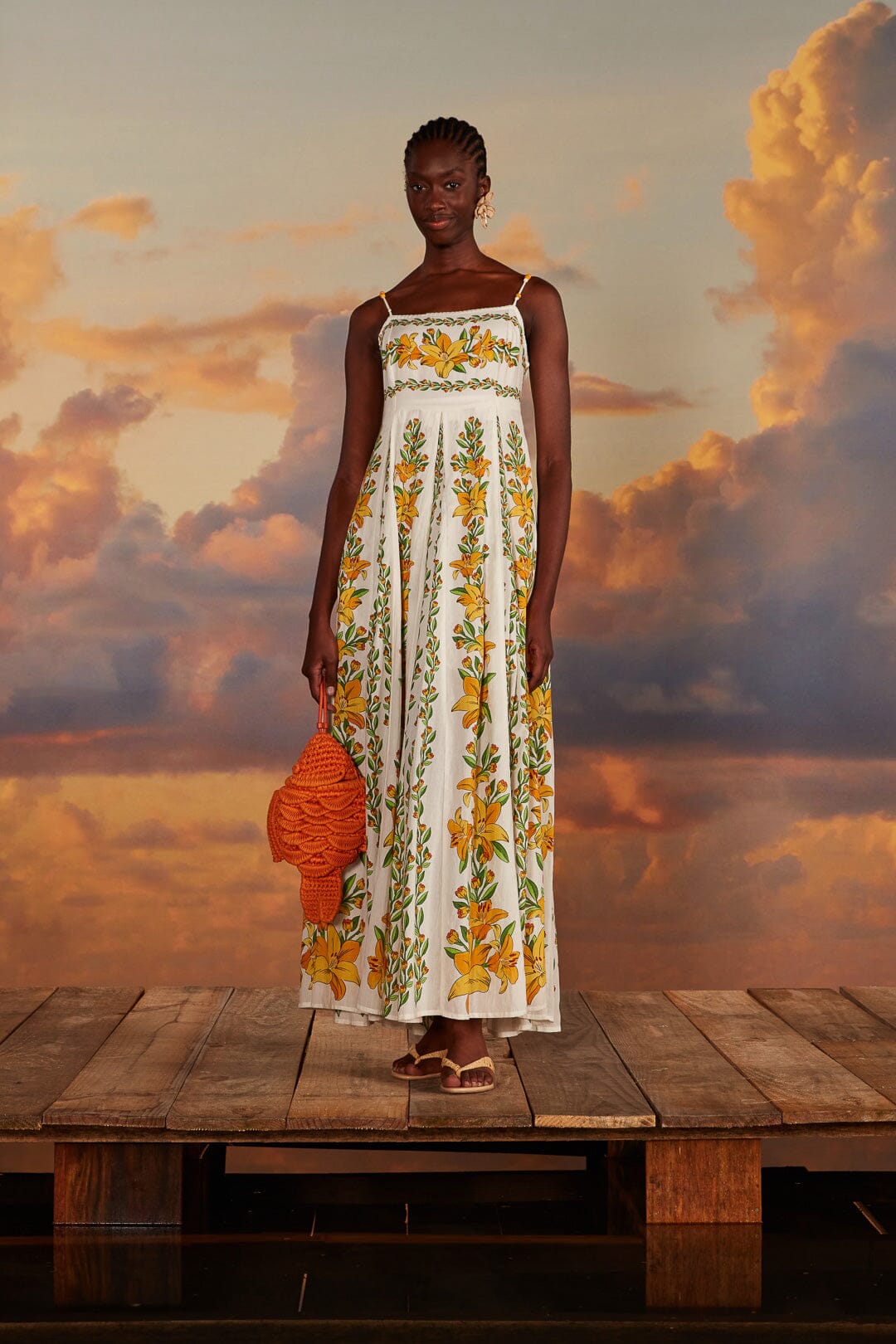 FARM Rio model wearing the Tropical Lightness Off-White Sleeveless Maxi Dress