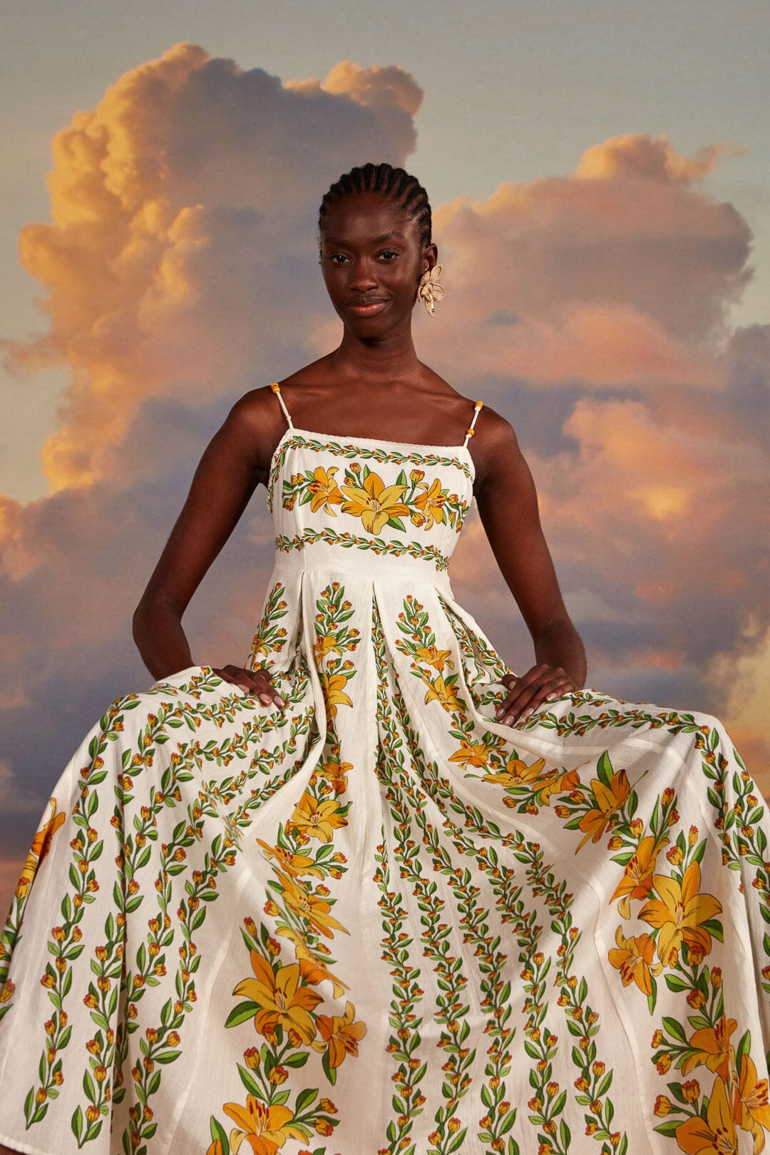 FARM Rio model wearing the Tropical Lightness Off-White Sleeveless Maxi Dress