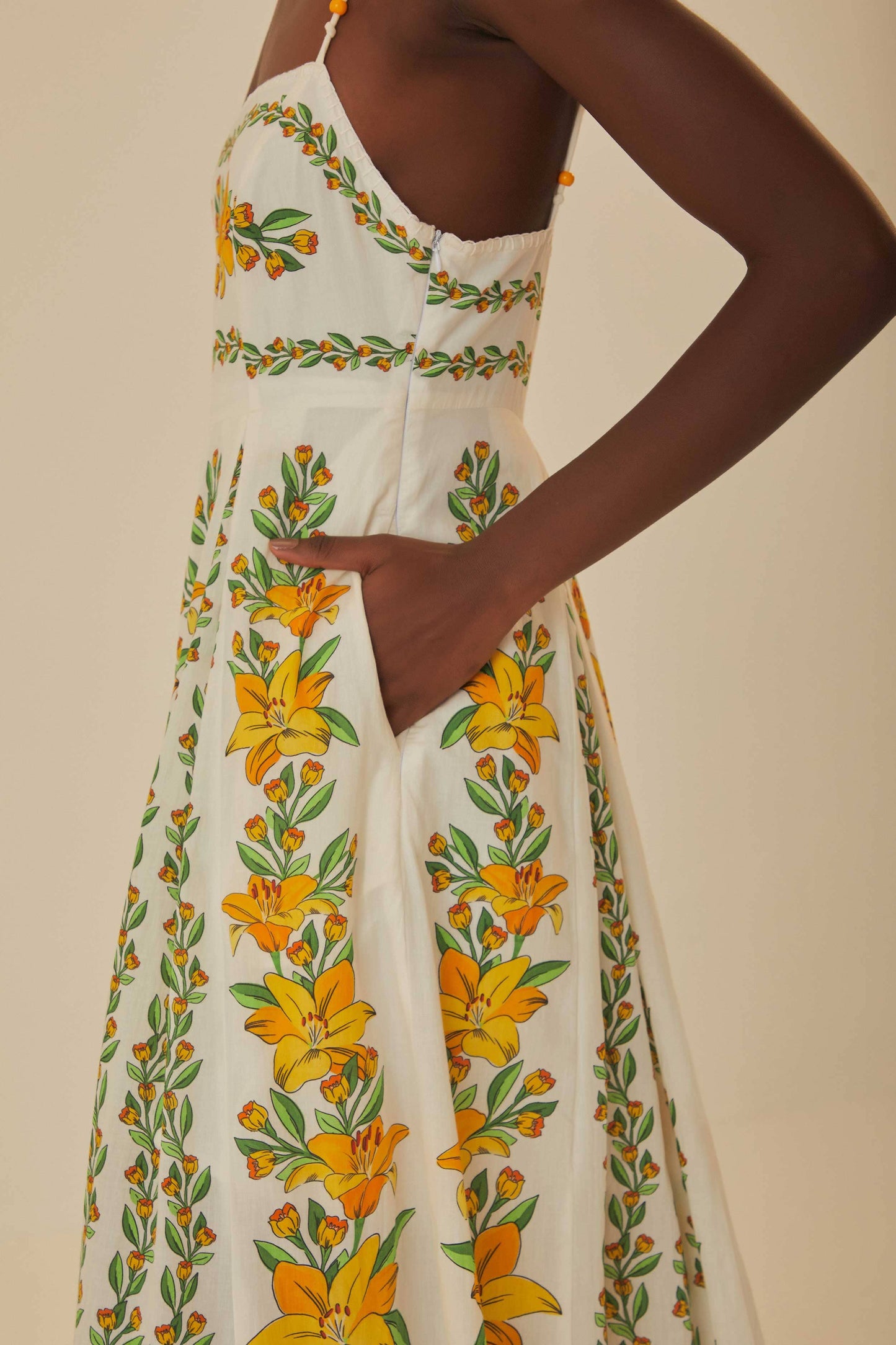FARM Rio model wearing the Tropical Lightness Off-White Sleeveless Maxi Dress