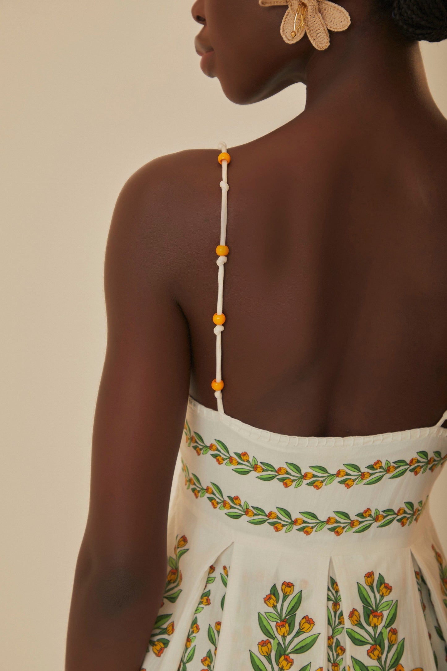 FARM Rio model wearing the Tropical Lightness Off-White Sleeveless Maxi Dress