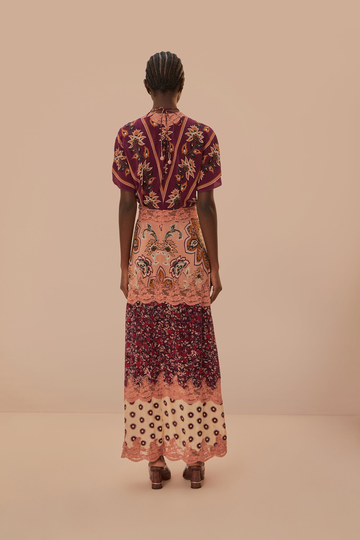 FARM Rio model wearing the Glam Tapestry Burgundy Laces Short Sleeve Maxi Dress