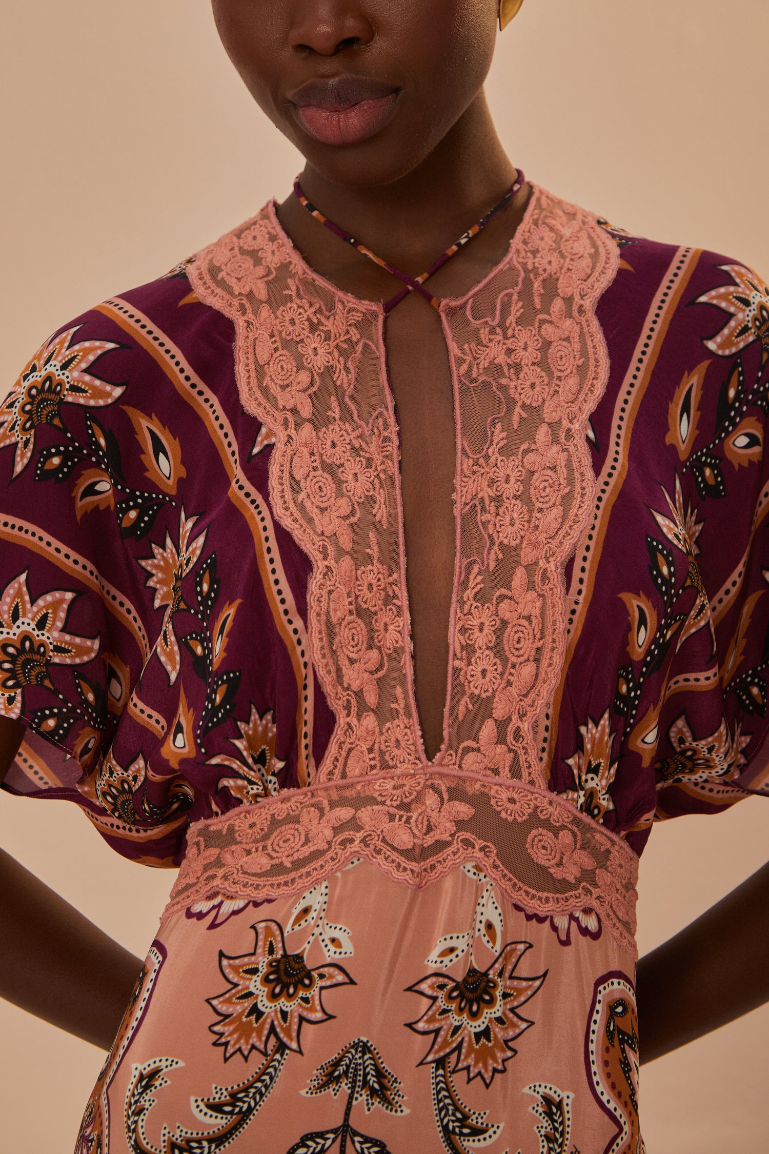 FARM Rio model wearing the Glam Tapestry Burgundy Laces Short Sleeve Maxi Dress