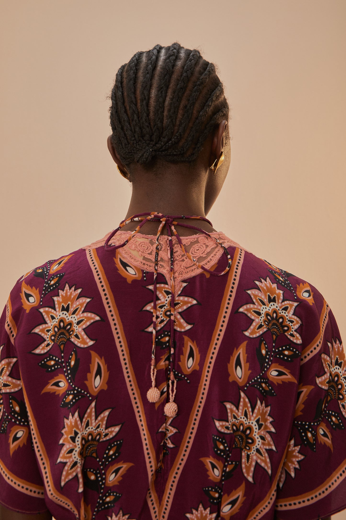 FARM Rio model wearing the Glam Tapestry Burgundy Laces Short Sleeve Maxi Dress