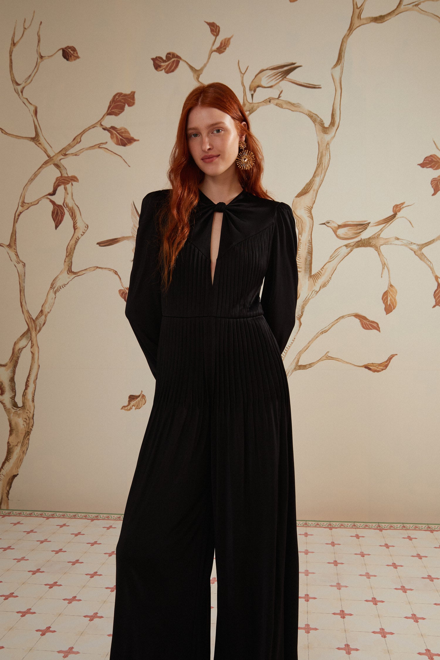 FARM Rio model wearing the Black Long Sleeve Knot Jumpsuit