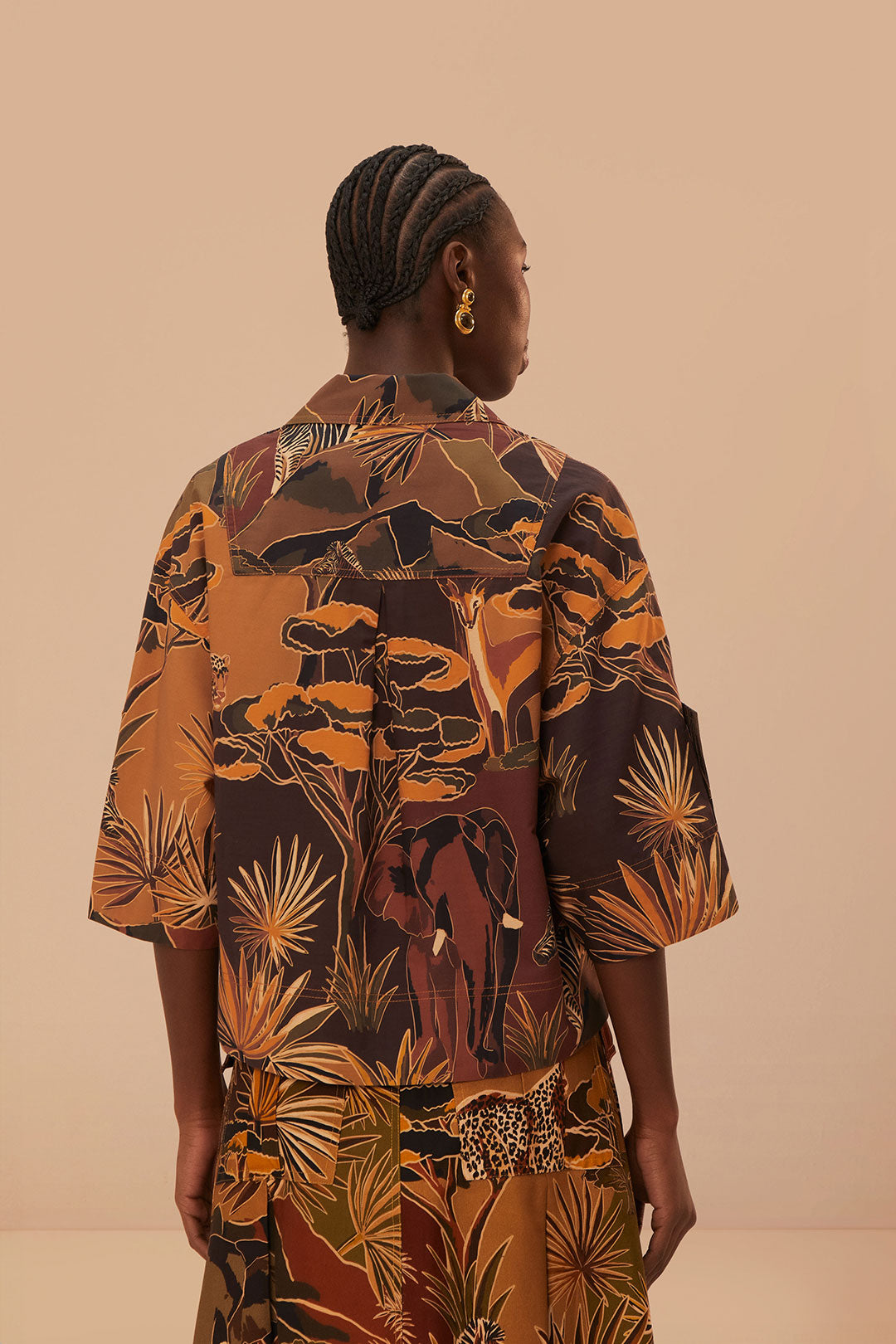 FARM Rio model wearing the Savana Dream Caramel Utility Blouse
