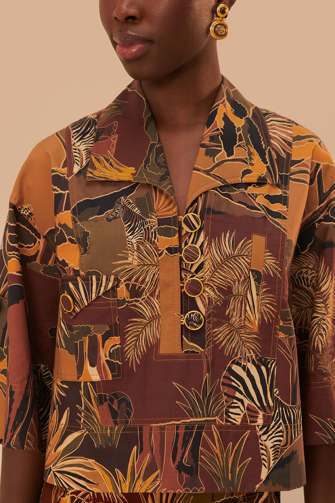 FARM Rio model wearing the Savana Dream Caramel Utility Blouse