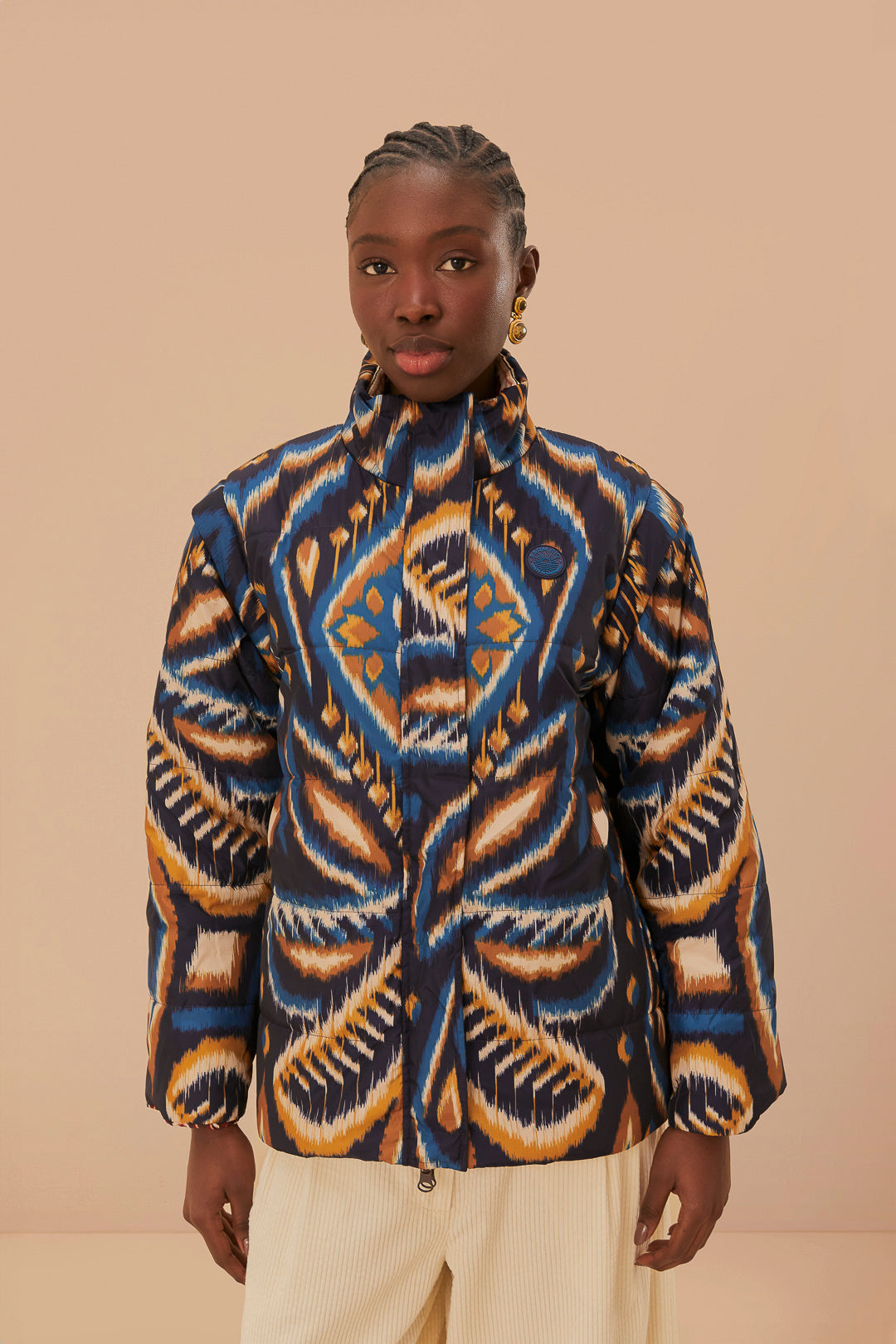 FARM Rio model wearing the Toucans Scarf Reversible Puffer Jacket
